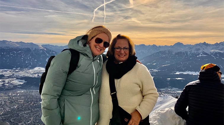 Nicole and Kathy with mountain landscape