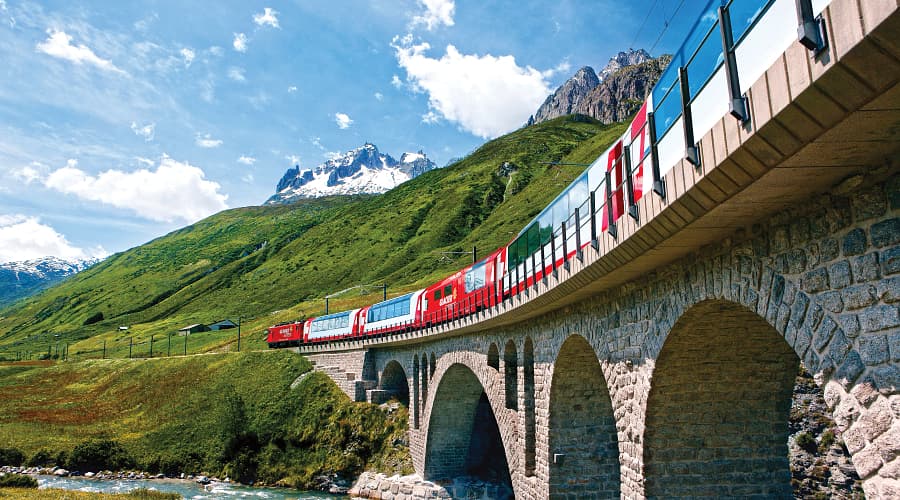 The Glacier Express, famously dubbed the "slowest express train in the world". This luxury panoramic train travels through the heart of the Swiss Alps, directly connecting the mountain resorts of Zermatt and St. Moritz.