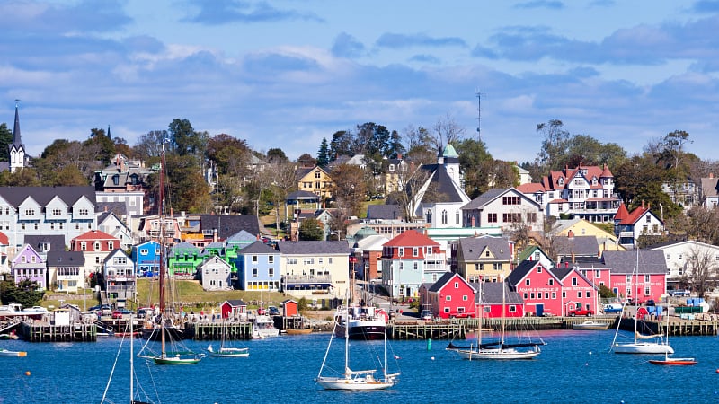 This image shows the historic waterfront of Old Town Lunenburg, located in Nova Scotia, Canada.