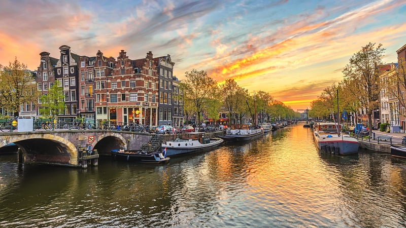 Journey Through Netherlands, Belgium & France, the canals at sunset in Amsterdam