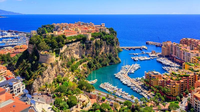 the Principality of Monaco, specifically highlighting the old town district of Monaco-Ville situated on the "Rock of Monaco".