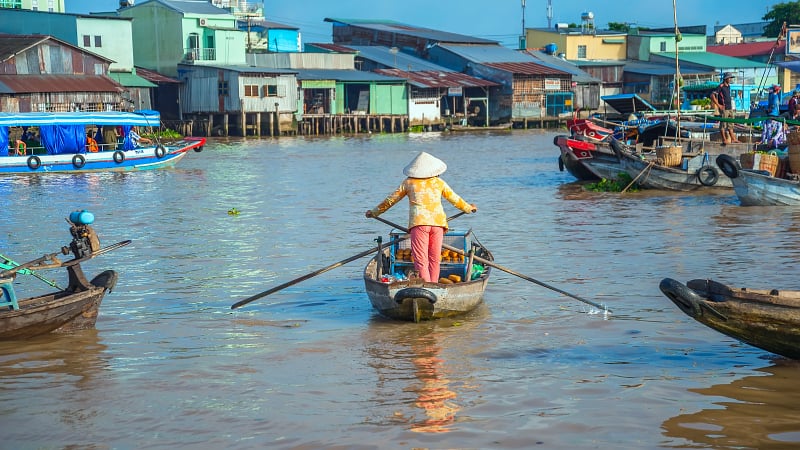 A\ wooden boat on the waters of the Mekong River