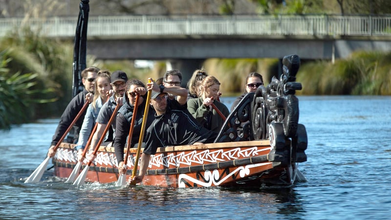 Māori waka experience navigating the Ōtākaro Avon River in Christchurch, New Zealand