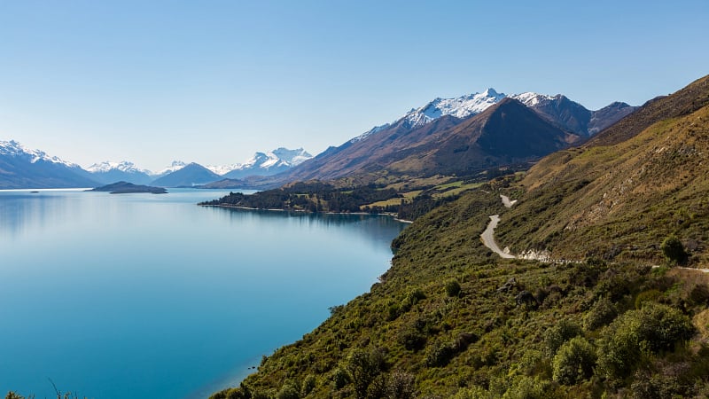 Beautiful road along the Lake, Queenstown, New Zealand.