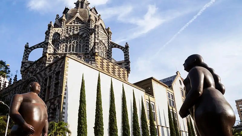 This image shows Plaza Botero in Medellín, Colombia, a famous public square that doubles as an open-air museum.