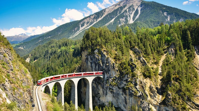 Swiss Alps with Train AdobeStock 507162028