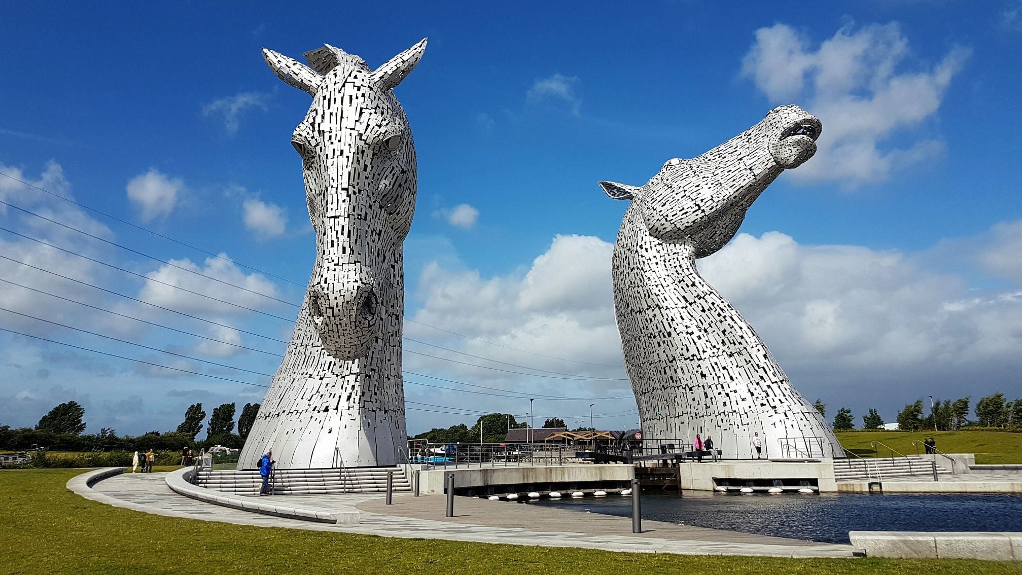 a pair of structural steel horse-head sculptures