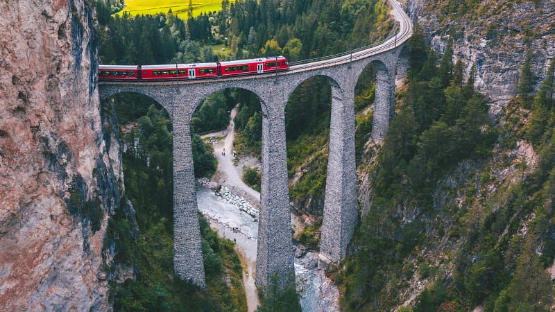 The famous Landwasser Viaduct, an iconic single-track railway bridge located near Schmitten and Filisur in the canton of Graubünden, Switzerland.