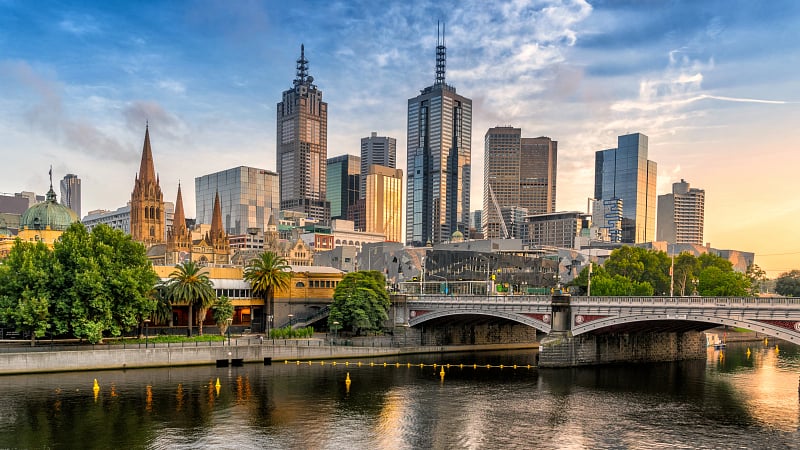 view of the Melbourne city skyline in Victoria, Australia, captured from the Southbank side looking over the Yarra River.