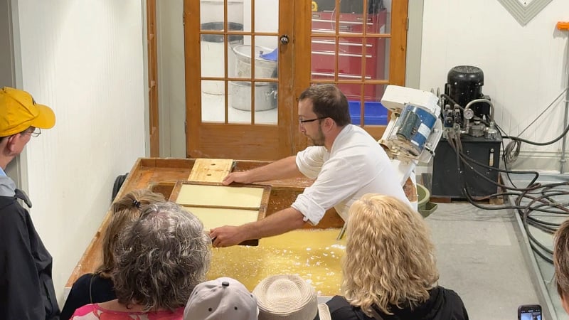 a live demonstration of traditional handmade papermaking.
