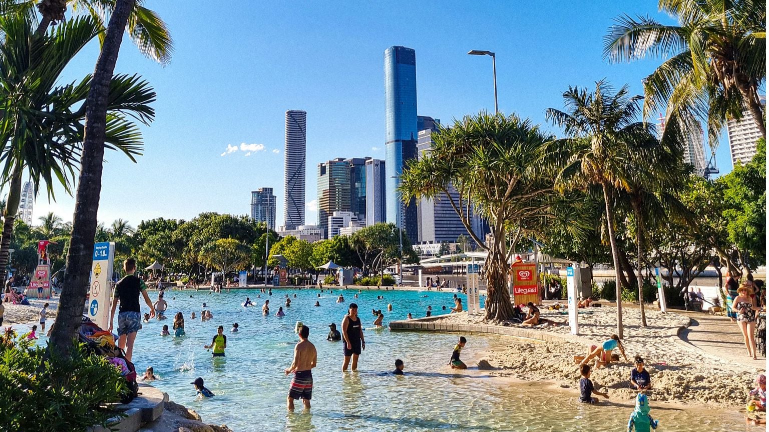 This is Streets Beach, a famous man-made beach located inside the South Bank Parklands in Brisbane, Australia.