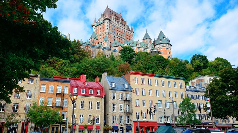 The iconic Fairmont Le Château Frontenac towering over the historic Lower Town (Basse-Ville) in Old Québec City, Canada.